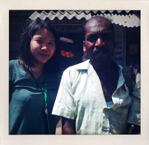 Passenger riding in the back of the autorickshaw