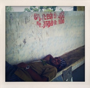 Karthik resting by the roadside during the trip