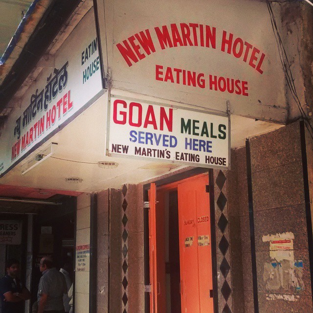 a photo of the outside of an old looking Goan seafood restaurant in Mumbai