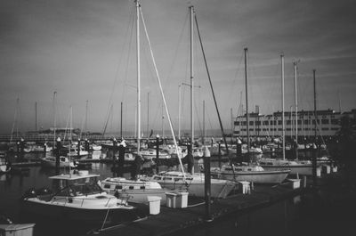 a black and white photograph of some yachts outside Fort Mason